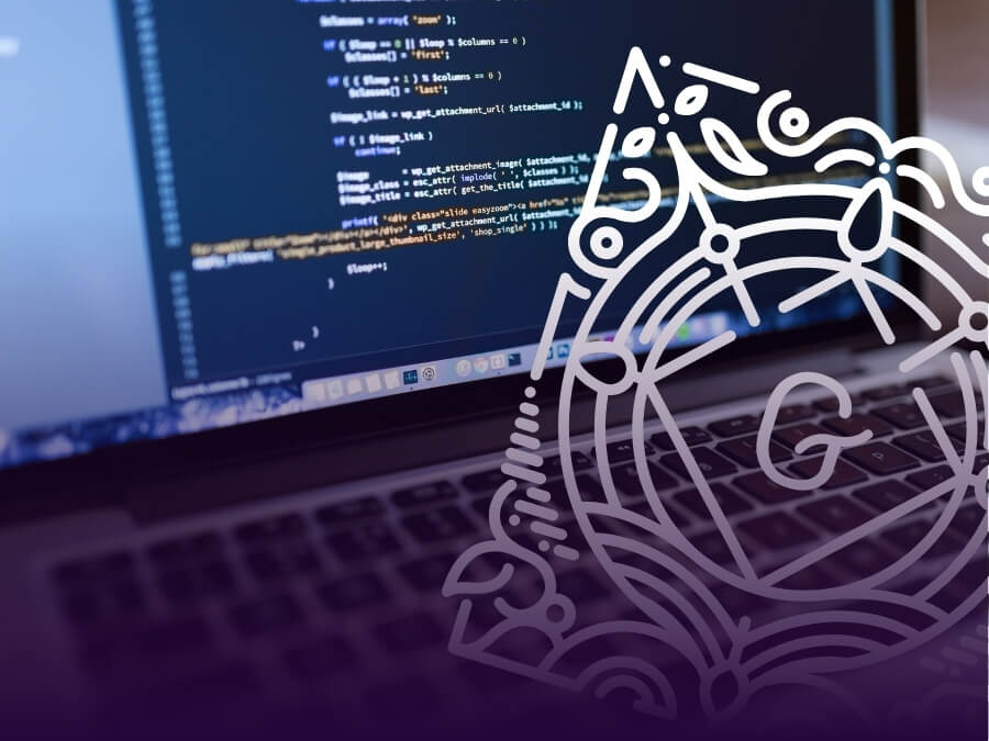 Laptop screen with WordPress code and overlay with Gutenberg logo.