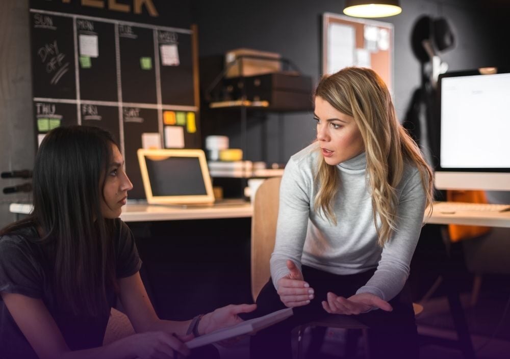 Agency team discussing a client project and delivery timeline